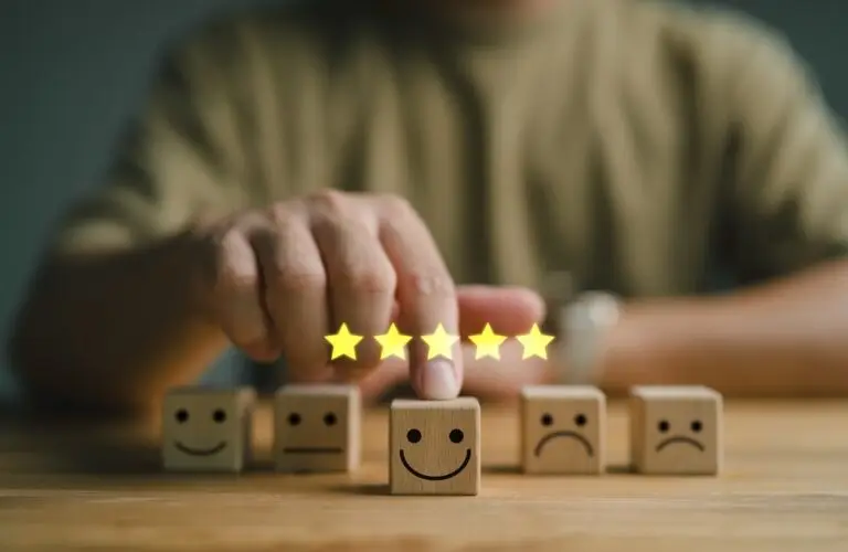 Person with blocks with mood faces